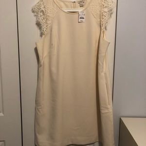 Laced shoulders with off-white cream body dress.